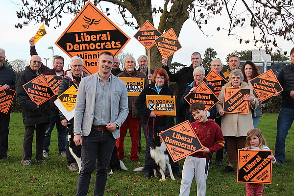 Parliamentary spokesperson Rob Herb with group of campaigners